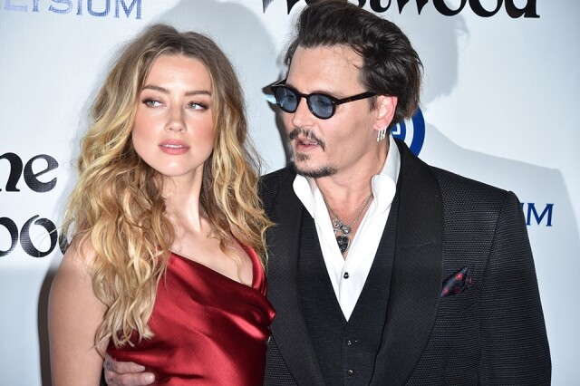 Johnny Depp 的第二任妻子 Amber Heard 險些讓他身敗名列 Johnny Depp 的第二任妻子 Amber Heard 險些讓他身敗名列